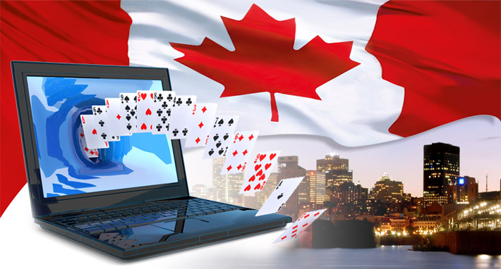 canadian flag with laptop and casino cards